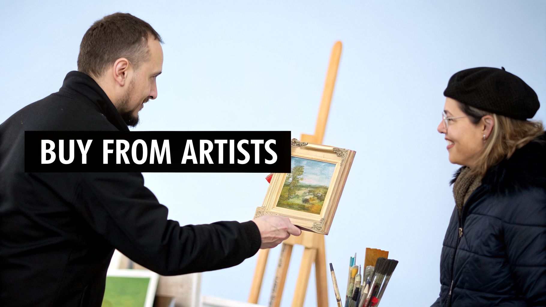 An artist presents a small landscape painting in a gold frame to a smiling woman, with painting supplies nearby.